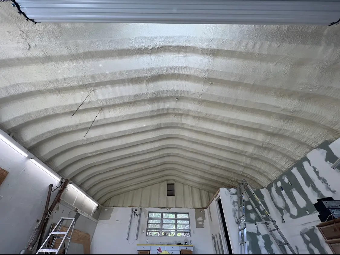 Spray polyurethane foam applied to the underside of a metal roof deck in Swoyersville